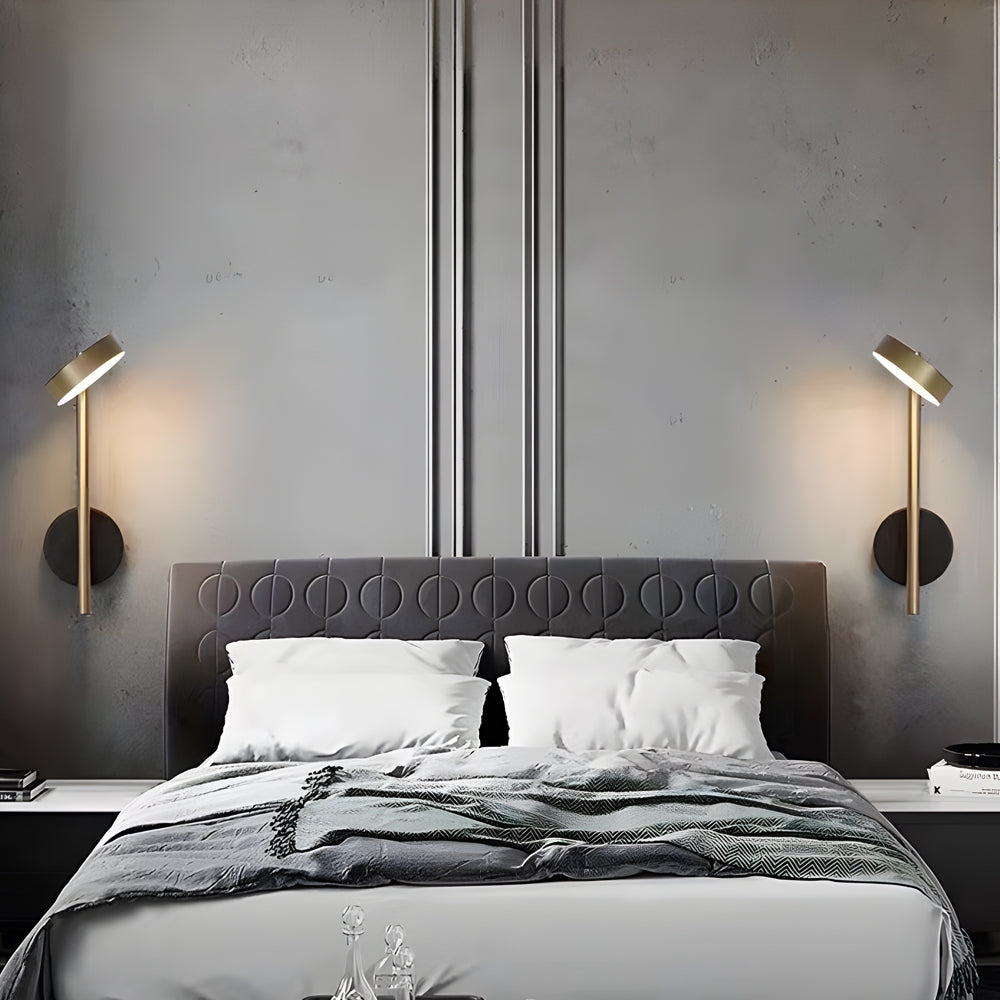Bedside lamps for wall with a black and gold finish, enhancing a stylish bedroom.