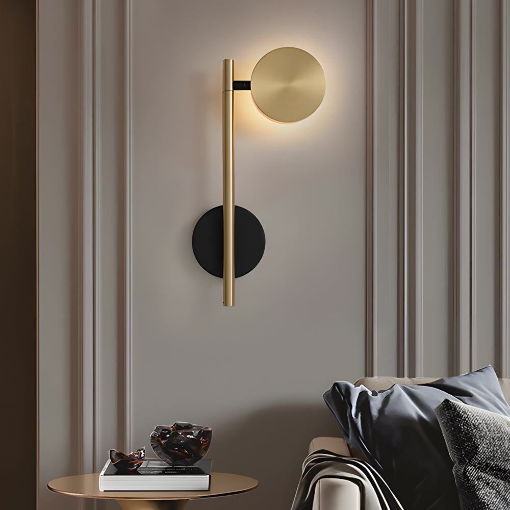 Bedside lamps for wall with a modern design, mounted beside a bed with gray bedding.