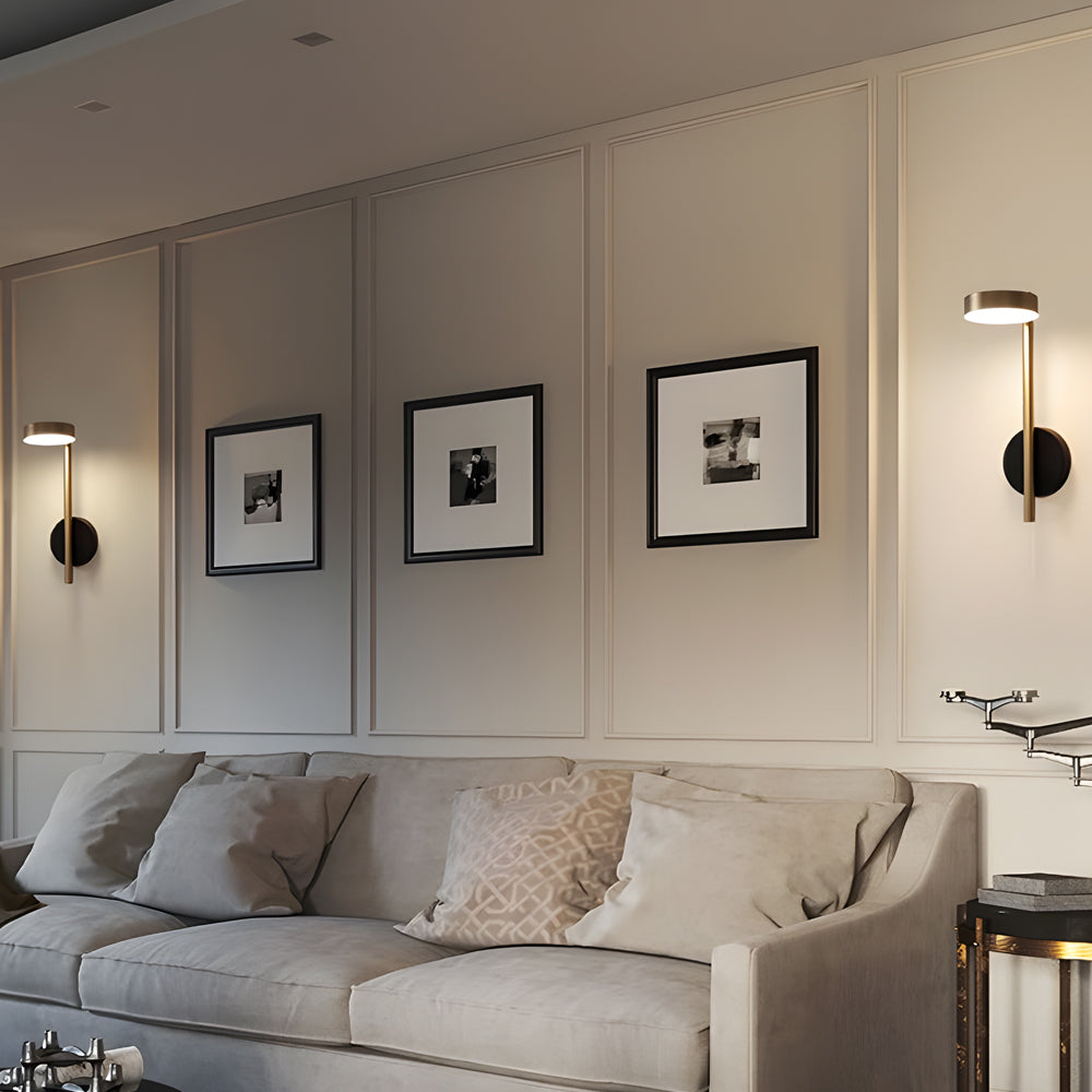 Bedside lamps for wall with a round design, providing ambient lighting in a cozy bedroom.