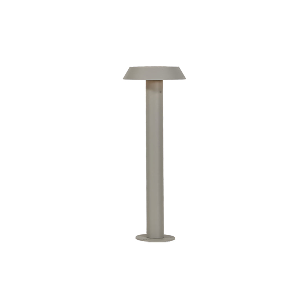 Short beige path lighting LED fixture with a dome-shaped top suitable for soft landscape lighting.
