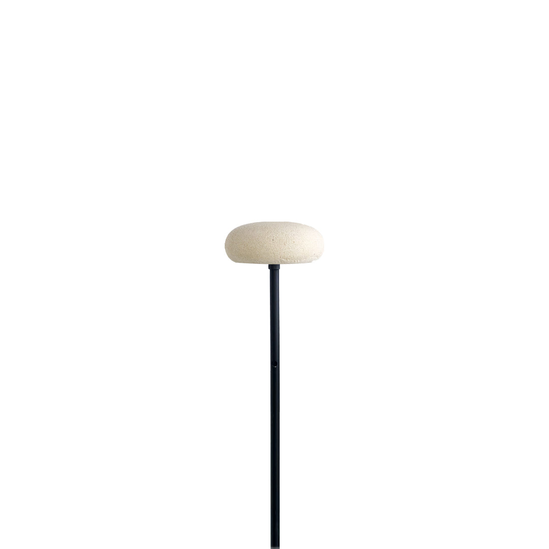 Warm beige mushroom pathway light with rounded top and slender stand for modern outdoor pathways.