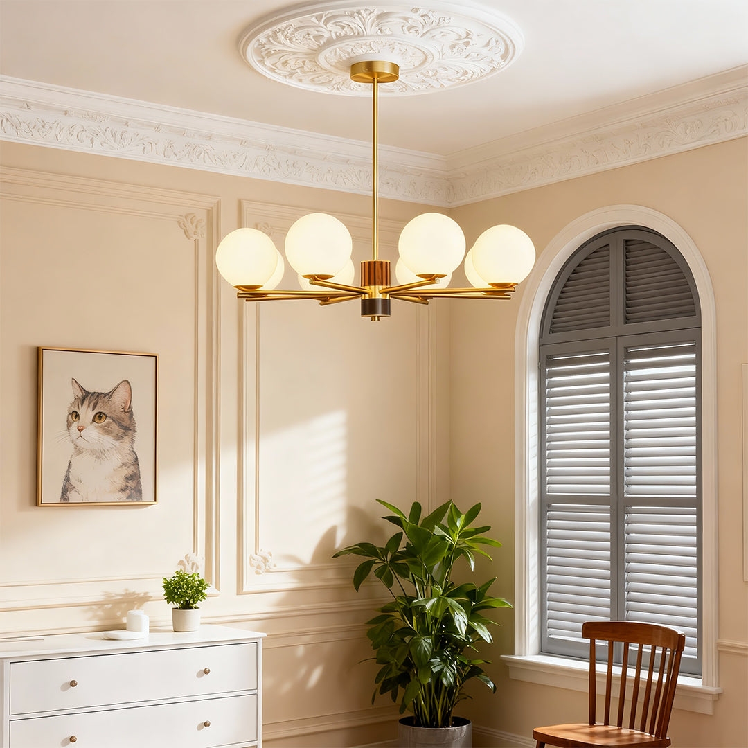 Best modern chandeliers illuminating bright living room with plants and arched mirror