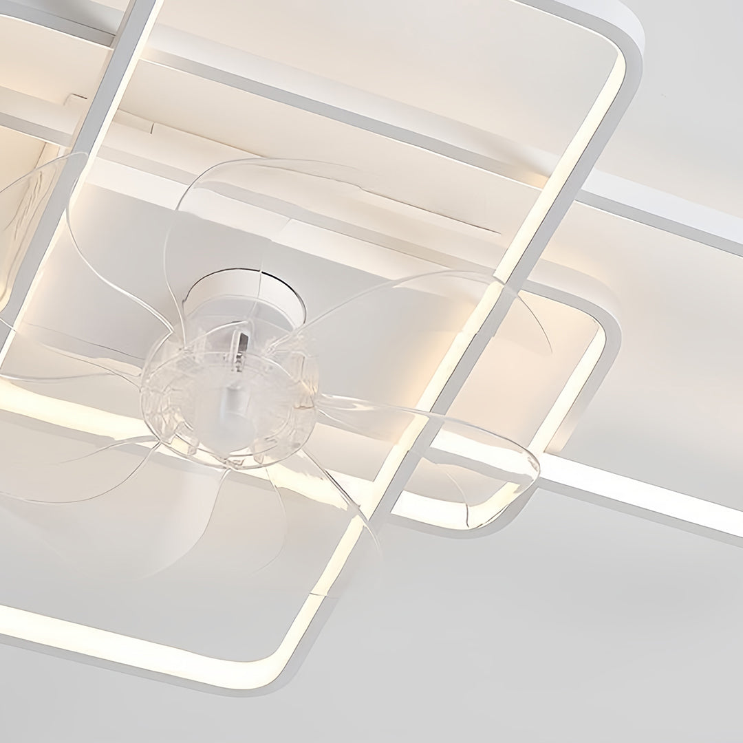 Bottom view of big ceiling fans with lights revealing geometric pattern and central mounting