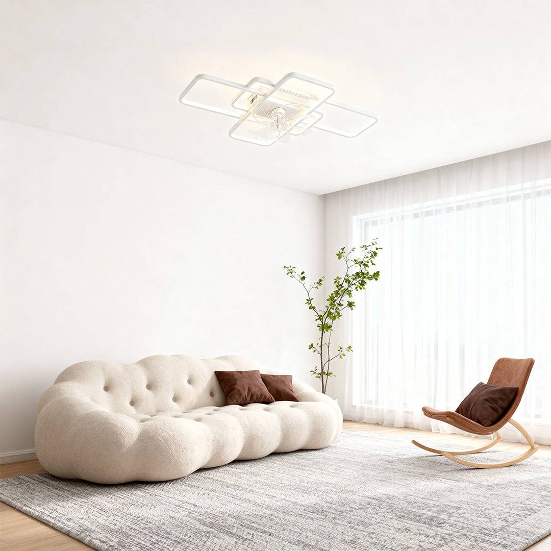Big ceiling fans with lights brightening minimalist space with white bean bag and lounge chair