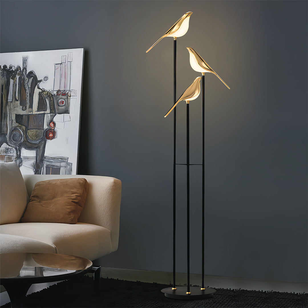Bird floor lamp in contemporary living space with neutral furniture creating artistic lighting and modern decor accent