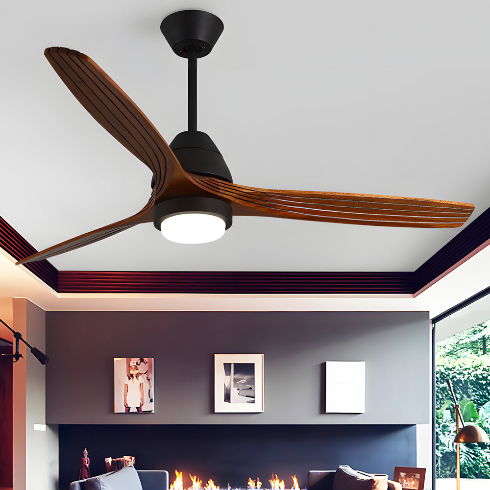 Stylish black 52 inch ceiling fans with lights over a modern fireplace in a living room.