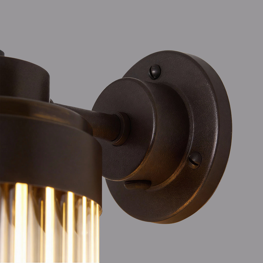 Close-up of black outdoor wall lighting LED fixture showcasing sturdy mount and adjustable arm for precise light direction.