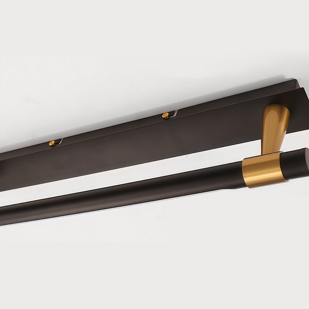 Black and gold vanity light in modern style, front view of the elegant design.