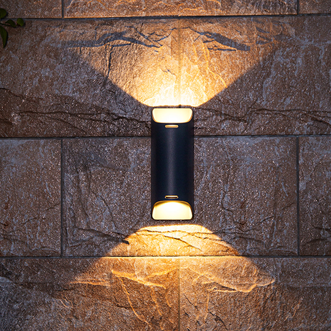 Modern black angular wall light with geometric design and contemporary architectural styling