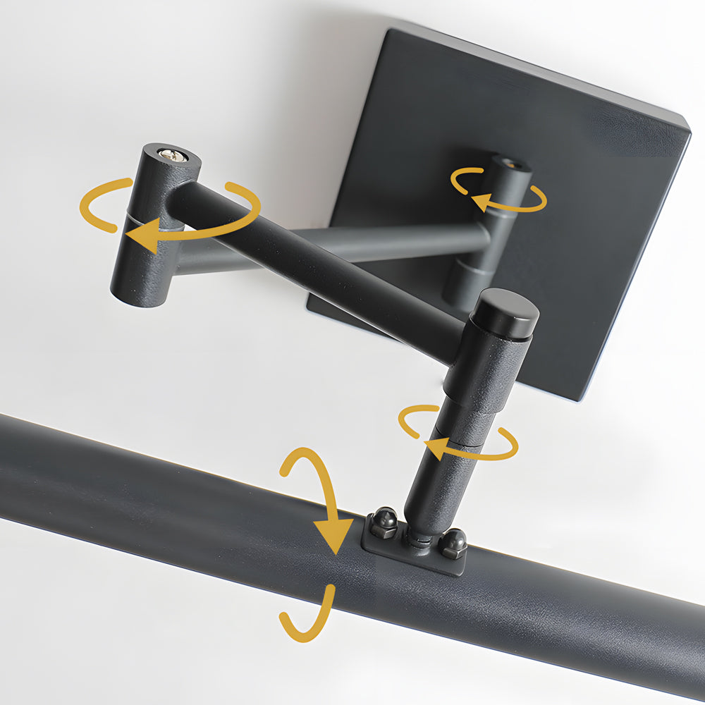 Adjustable joint detail of a black bar vanity light