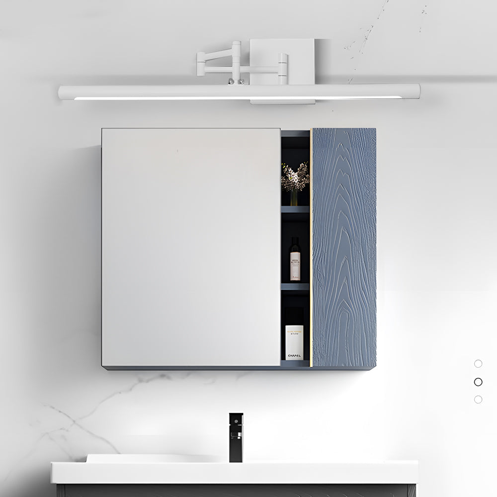 Black bar vanity light installed above a bathroom medicine cabinet