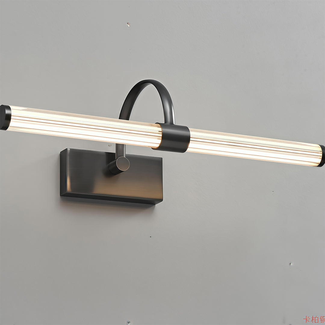 Black bathroom vanity wall light on grey backdrop showing illuminated LED strip and mounting hardware.