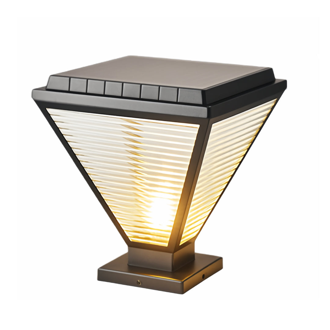 Black and bronze pillar lights led featuring a wide top shade and warm glow.