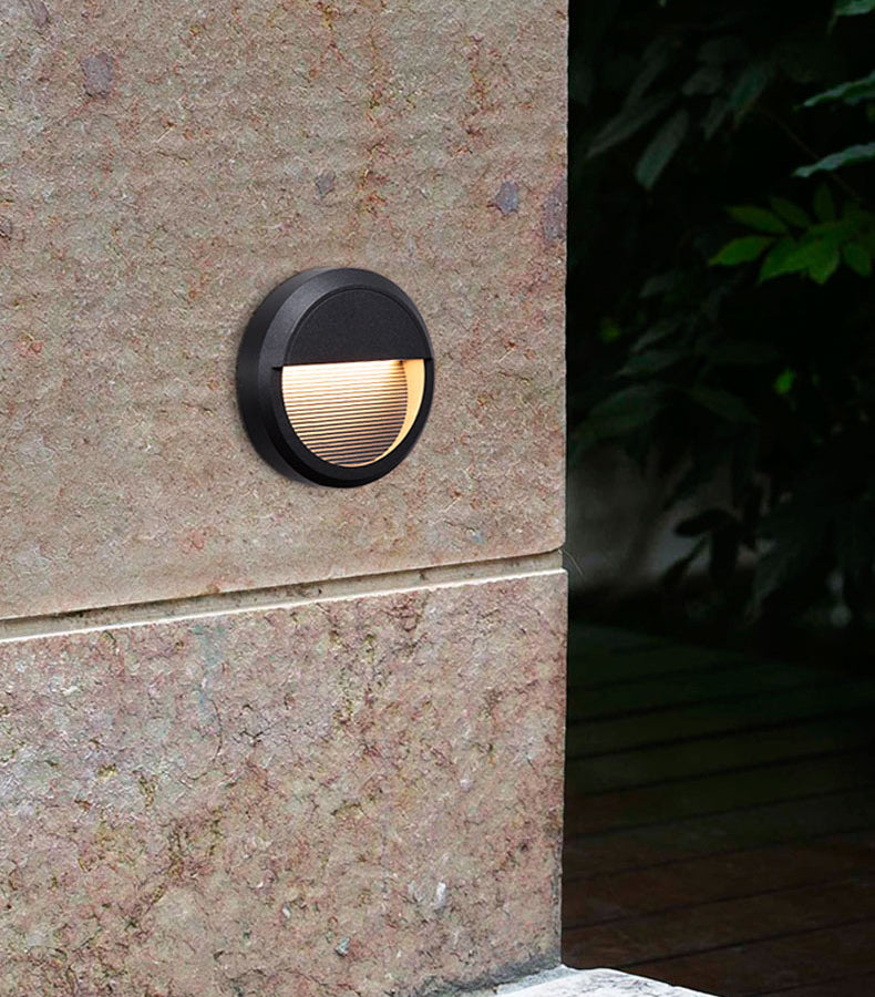 Contemporary stair lighting with built-in LED fixtures providing safety illumination on modern steps