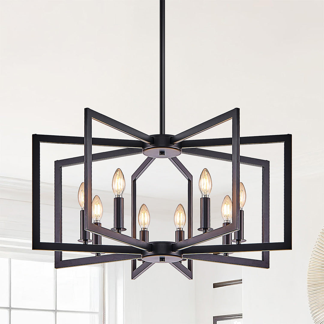 Black candle chandelier hanging over a bright kitchen table, creating a warm and cozy atmosphere.