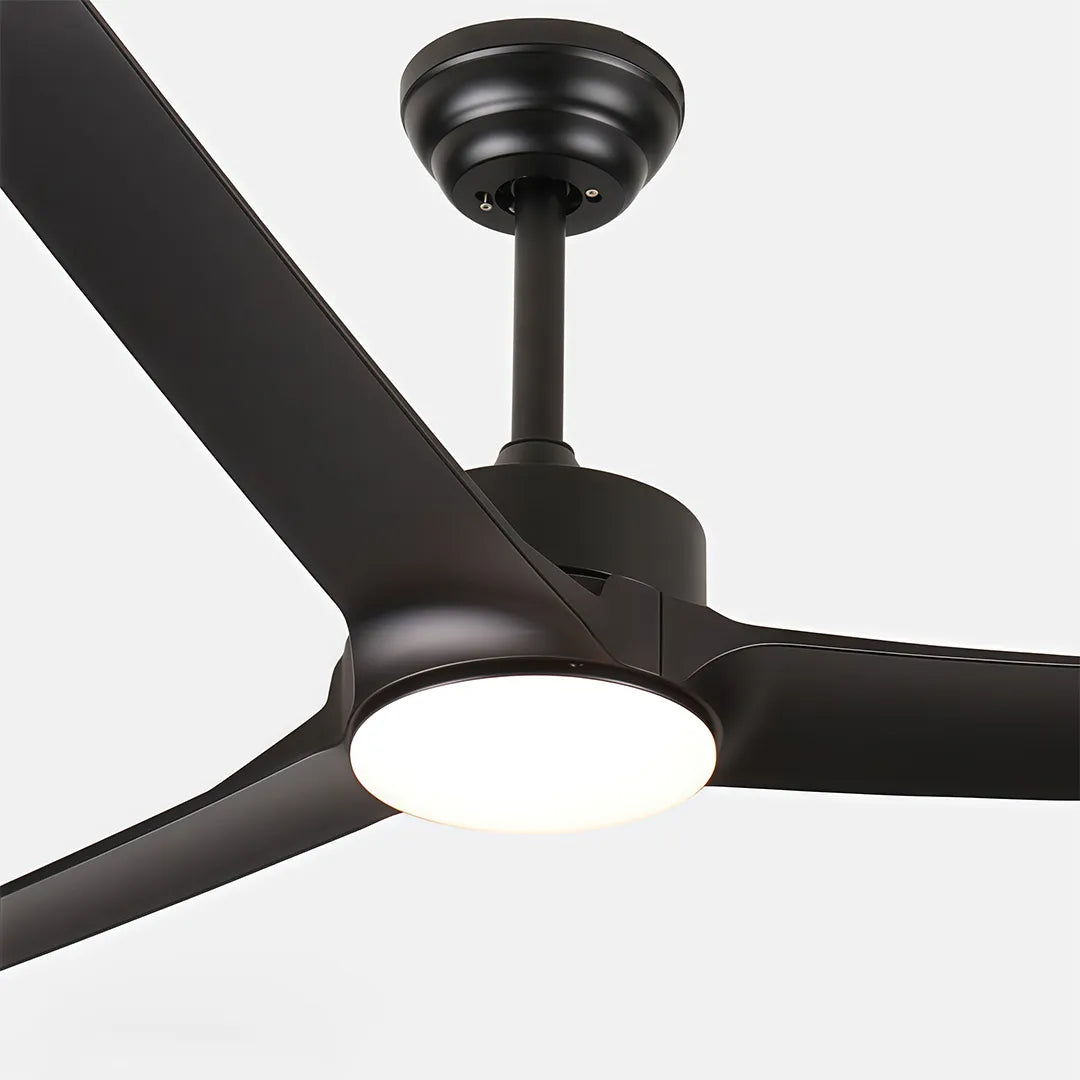 Close-up of a black ceiling fan with light featuring three sleek blades and an integrated LED fixture.