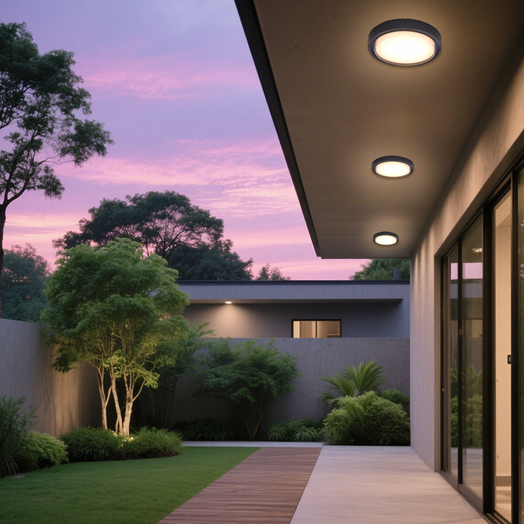 Modern black circular wall light with white LED panel for contemporary interior applications