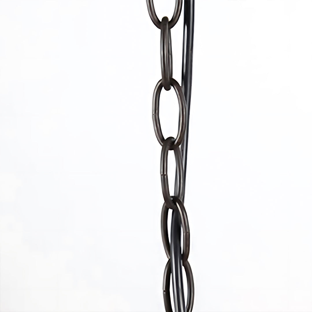 Black decorative chain link detail showing connection hardware for hanging fixtures