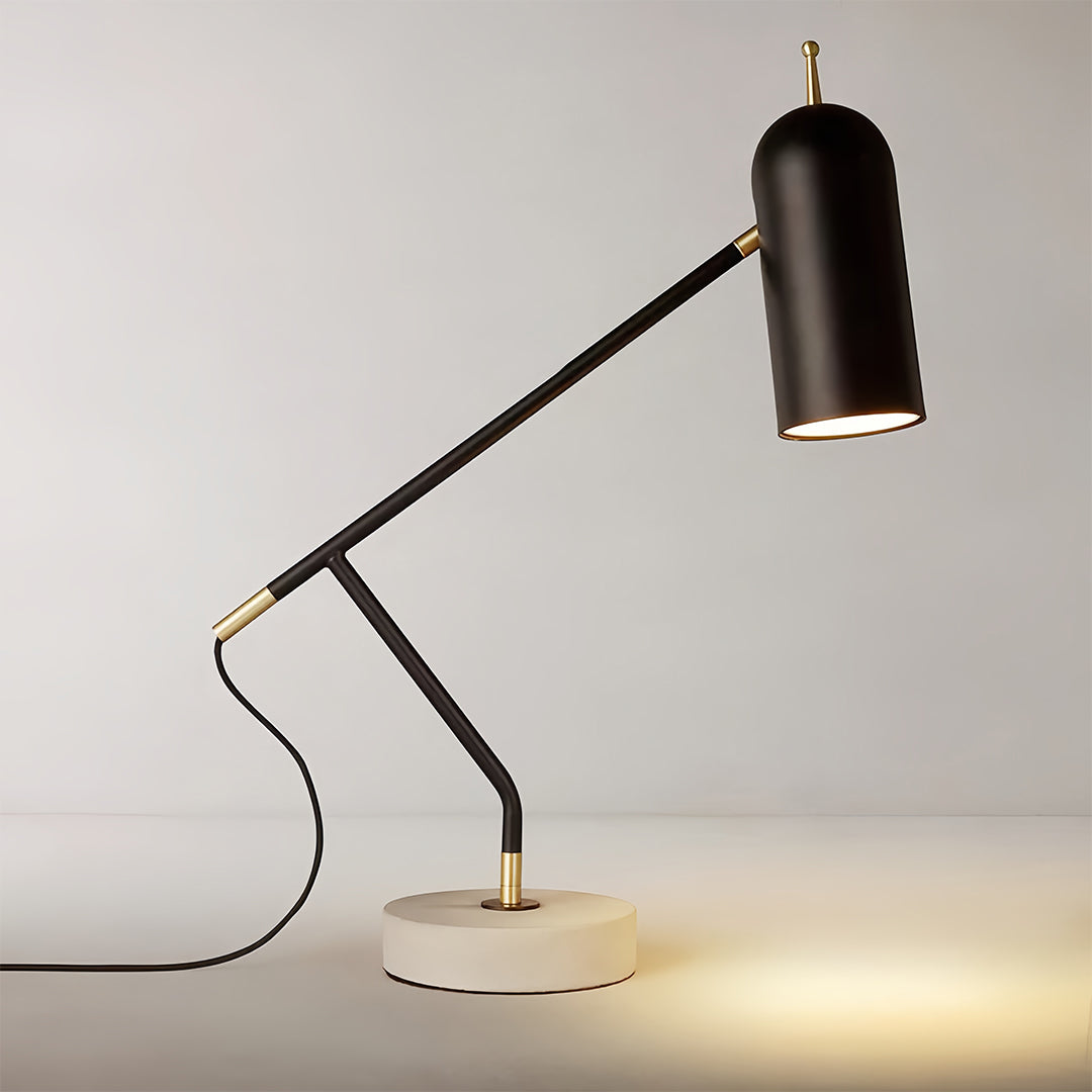 Black desk lamps providing task lighting in contemporary home office with clean aesthetic