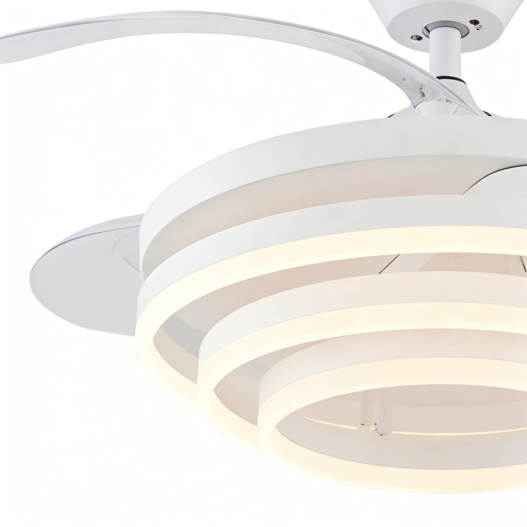 Black fan with light with a modern design, providing ambient light in a bedroom.