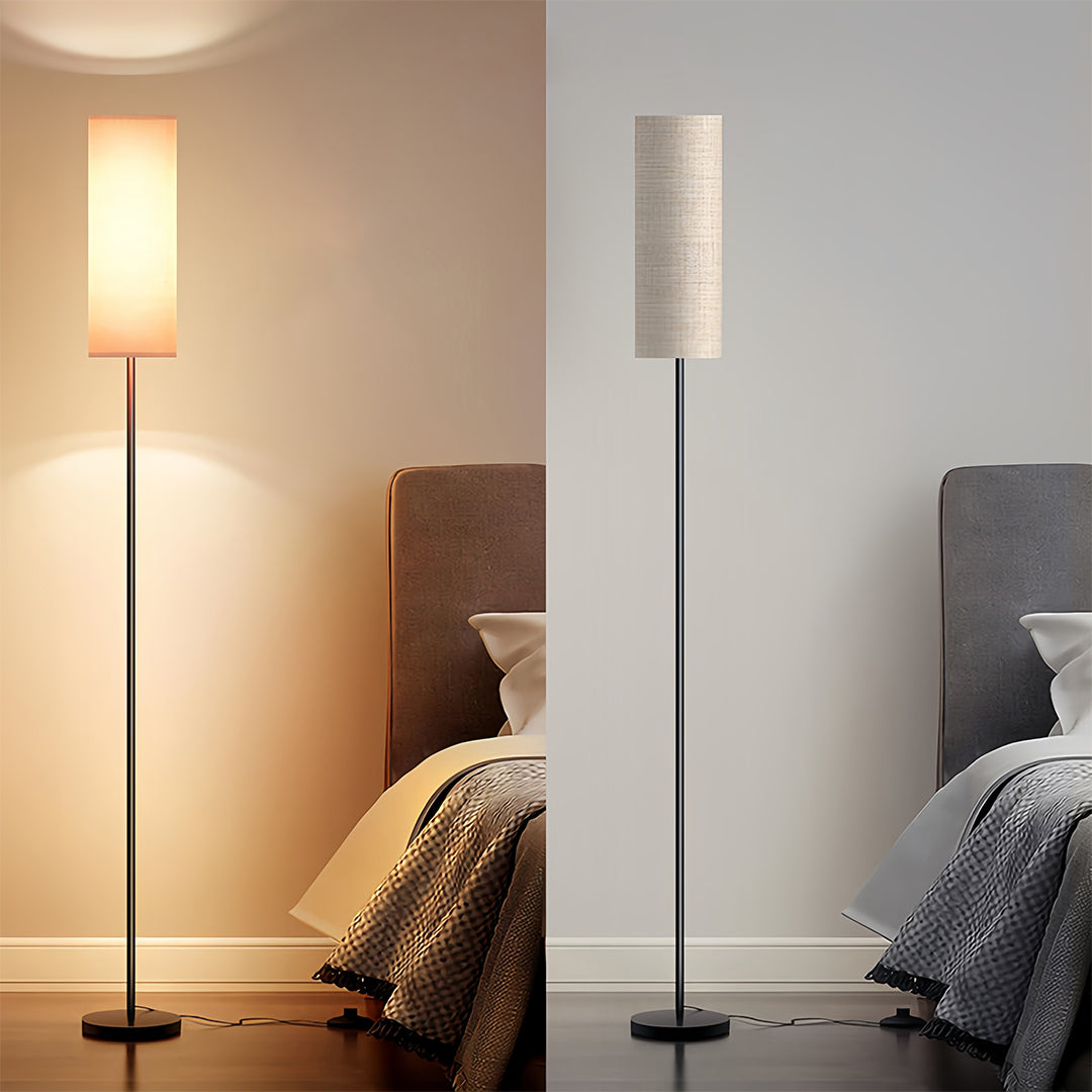 Black wrought iron floor lamps displayed in split scene showing warm and cool bedroom lighting effects