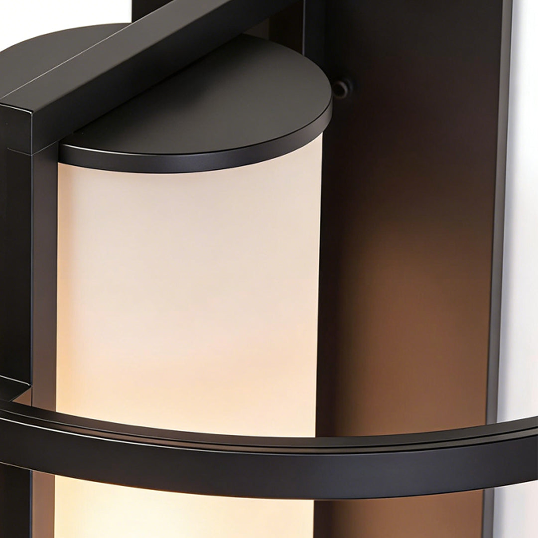Contemporary black outdoor wall mounted lighting fixture with frosted glass panel, perfect for stylish exterior illumination.