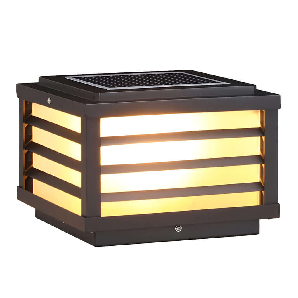 Black gate pillar light with a rectangular shape, featuring a close-up of its sleek design and warm glow.