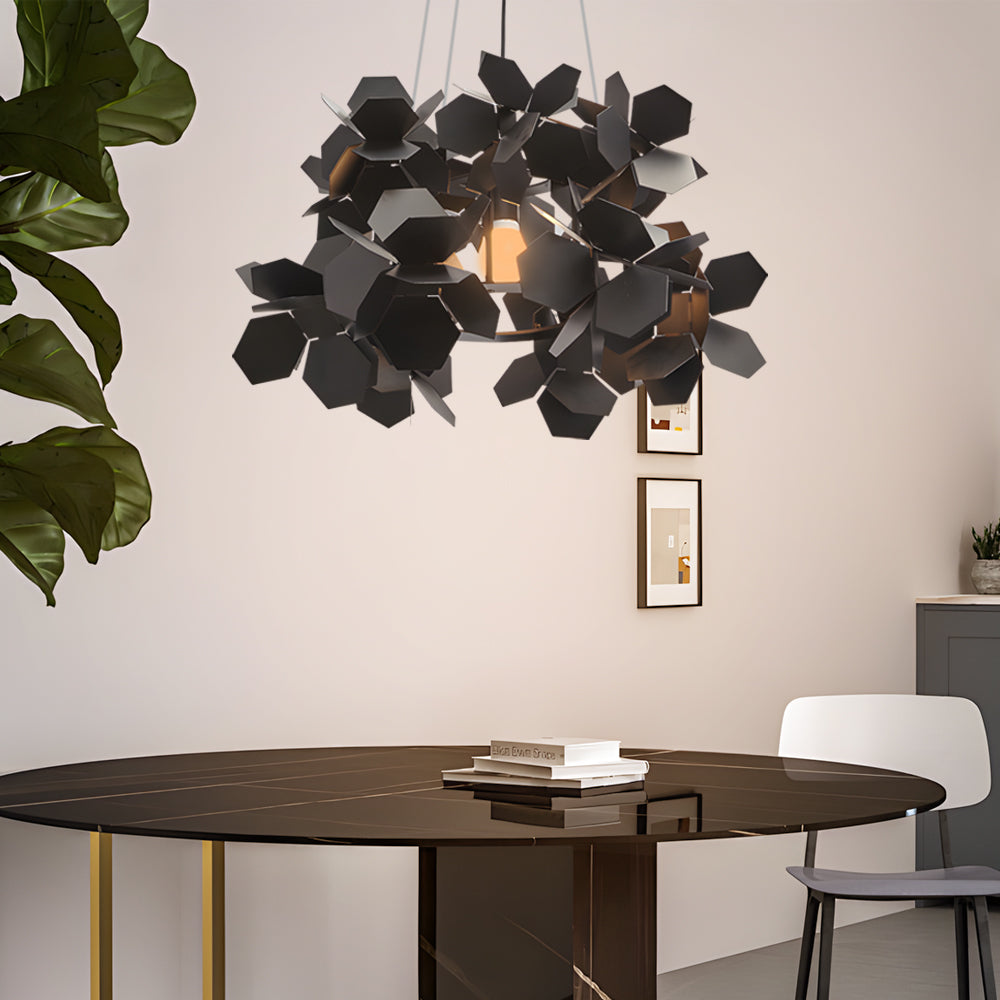 Close-up of black geometric chandelier showcasing its intricate leaf-inspired design.
