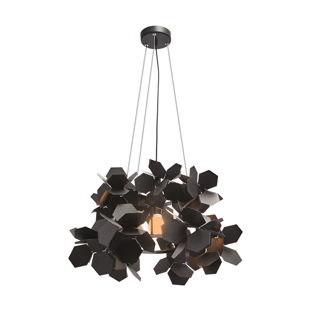Black geometric chandelier with a leaf-inspired design, hanging in a modern living area.
