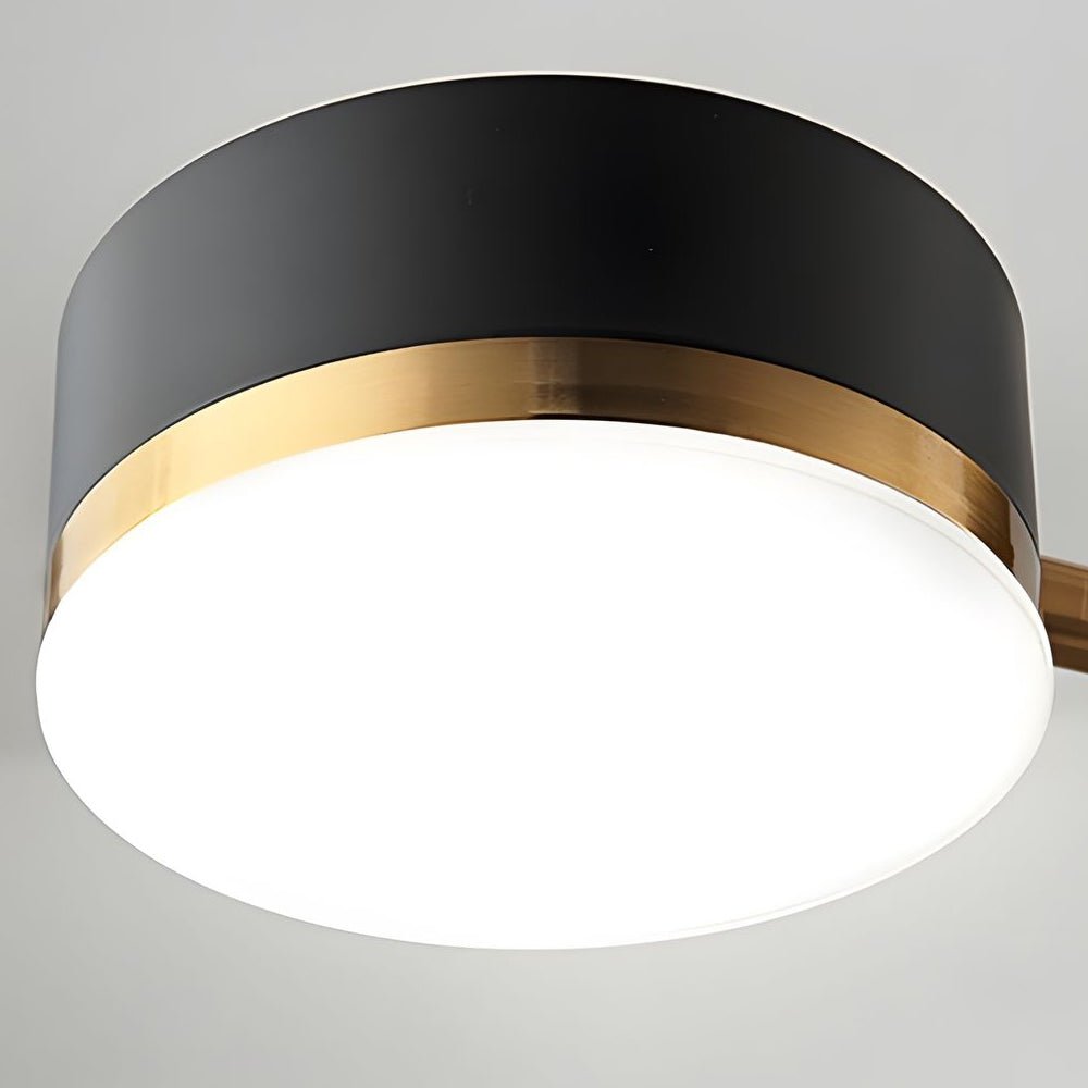 Black and gold sputnik ceiling light, highlighting its gold accents and black arms.