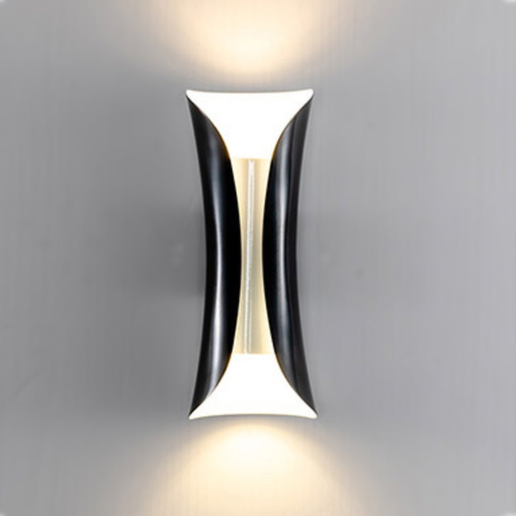 Black indoor up down wall lights with curved design and warm LED illumination.