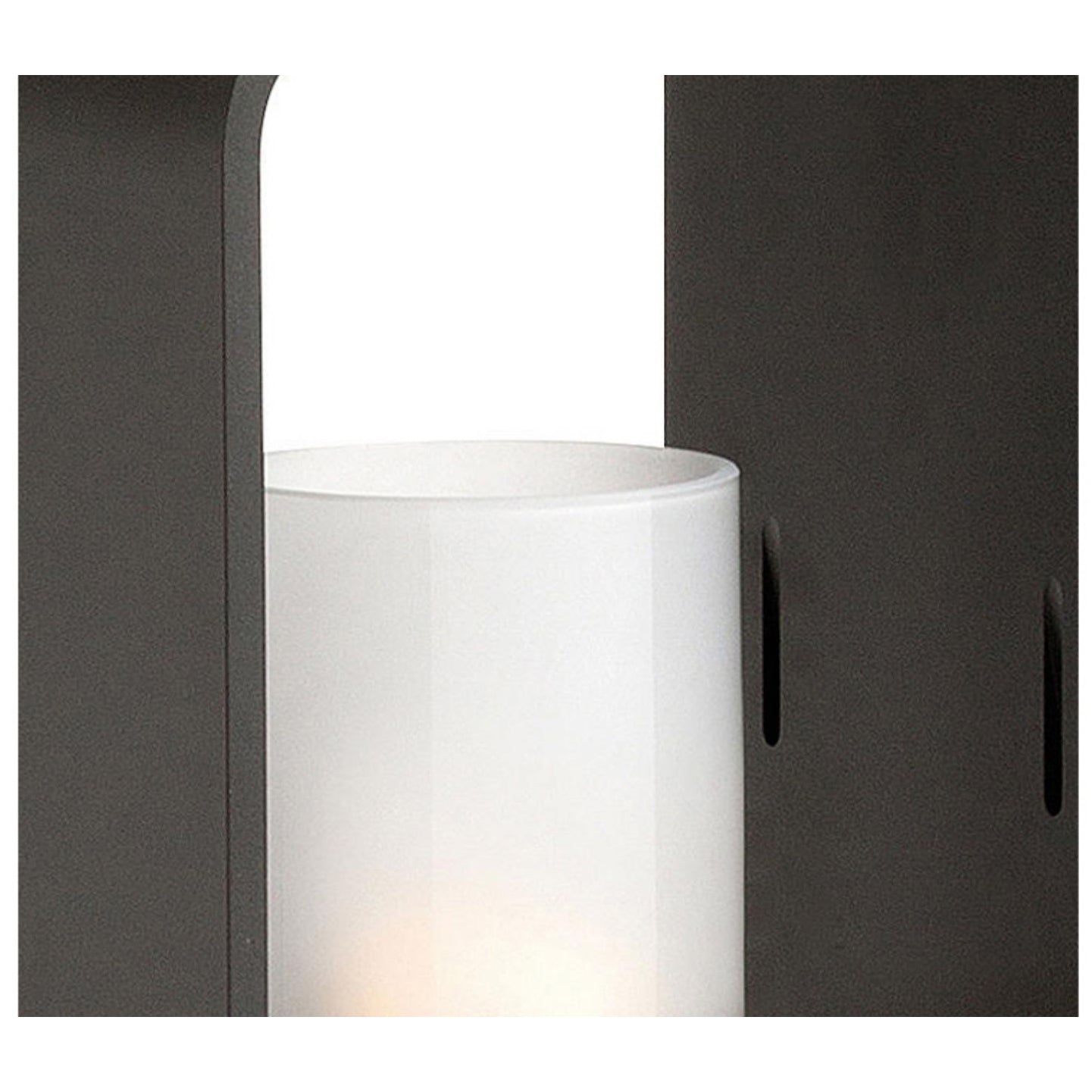 Black lantern outdoor light, close-up of curved frame and smooth surface texture.