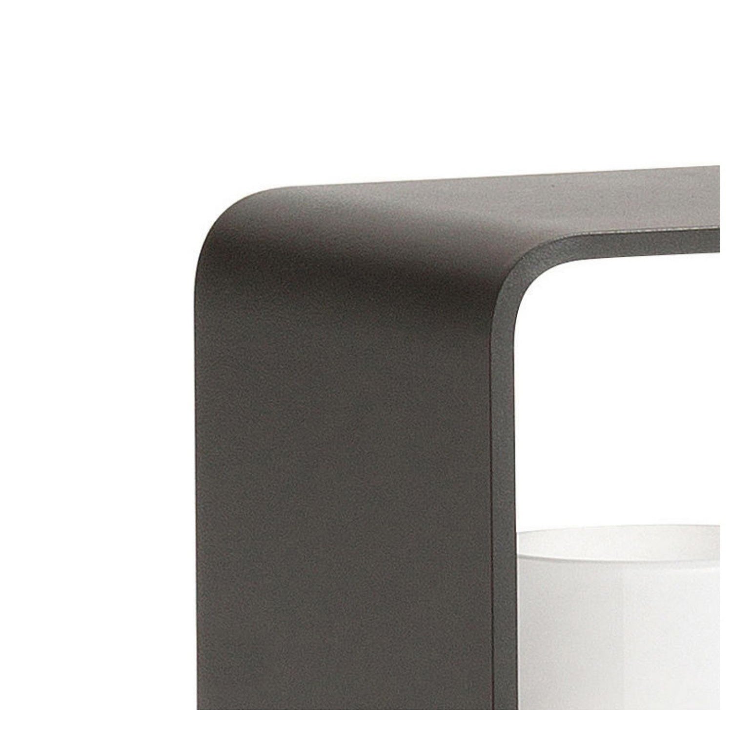 Black lantern outdoor light with modern design, placed on stone pillars near garden.