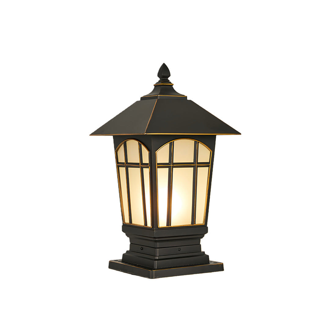 Large outdoor pillar lights with black frame and warm diffused glow.