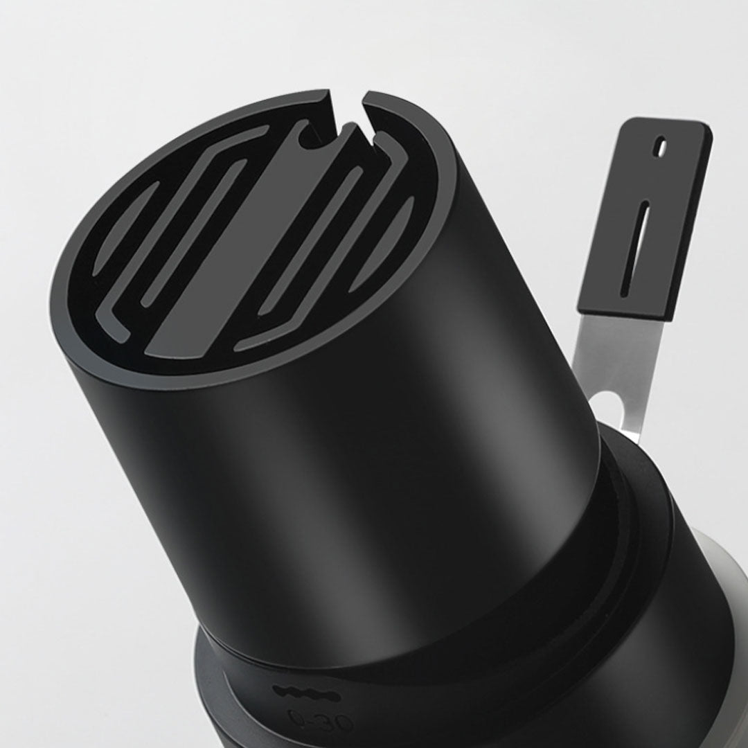 Close-up view of a black LED spotlight with a sleek, cylindrical design.
