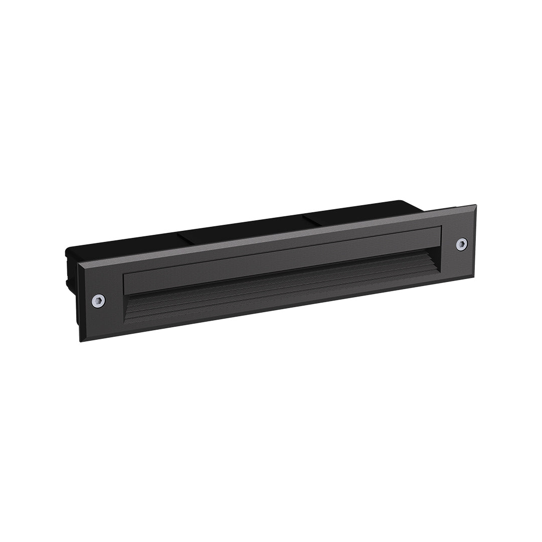 Black linear LED fixture with textured mesh front panel and low-profile rectangular housing