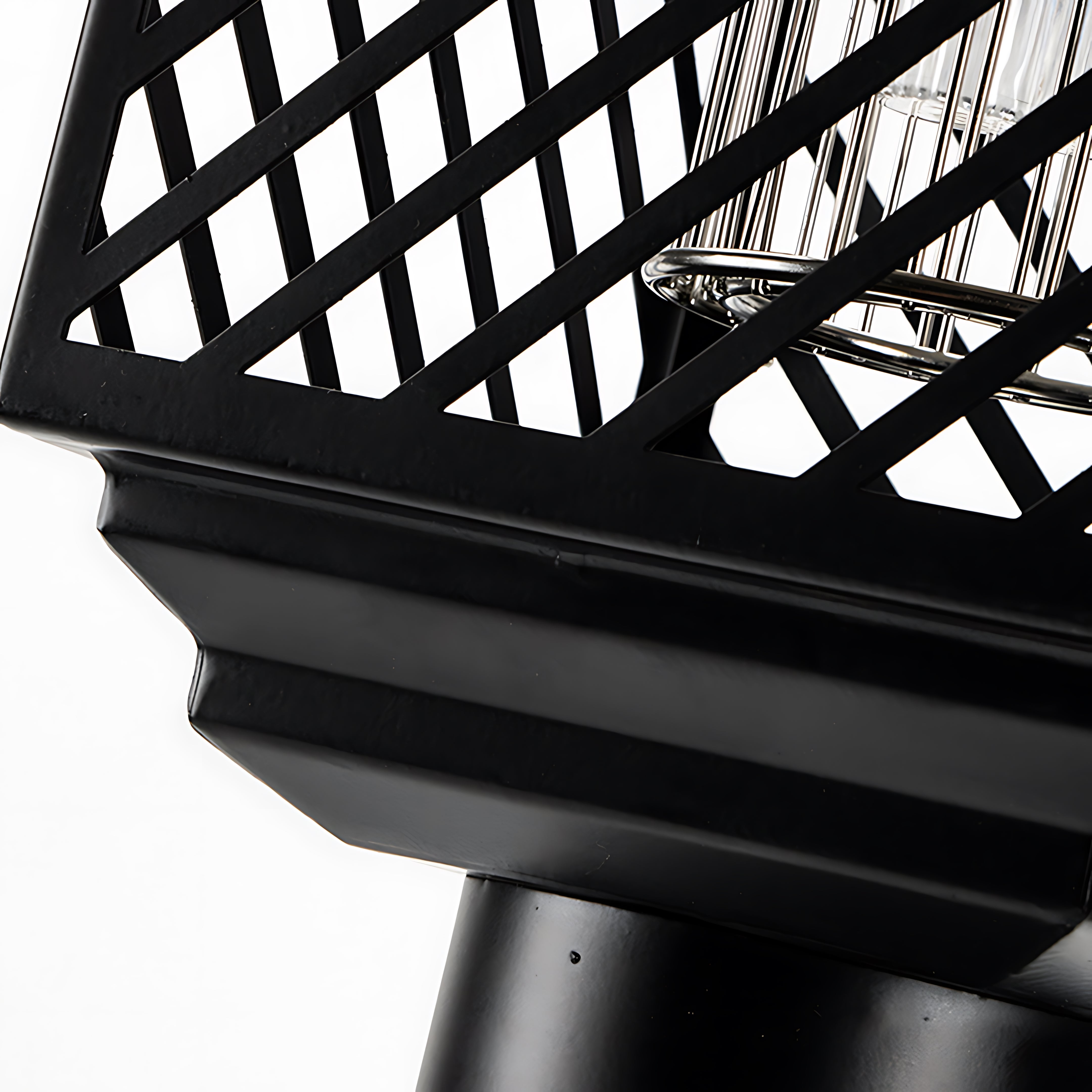 Detailed view of black mesh pattern and structural components of solar light design