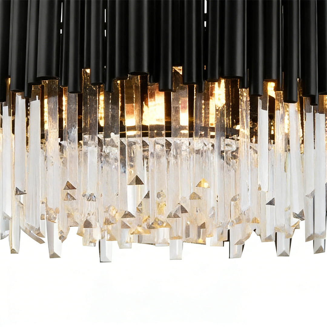 Black metal and crystal chandelier with a close-up of its intricate crystal and metal design.
