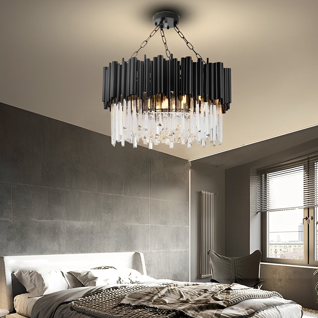 Black metal and crystal chandelier with a close-up of its sparkling crystals and black frame.