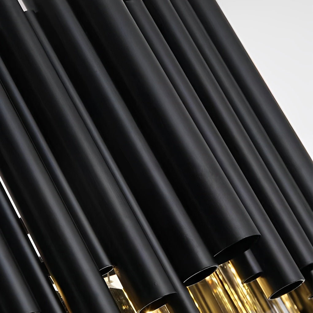 Black metal and crystal chandelier providing soft lighting in a cozy bedroom.