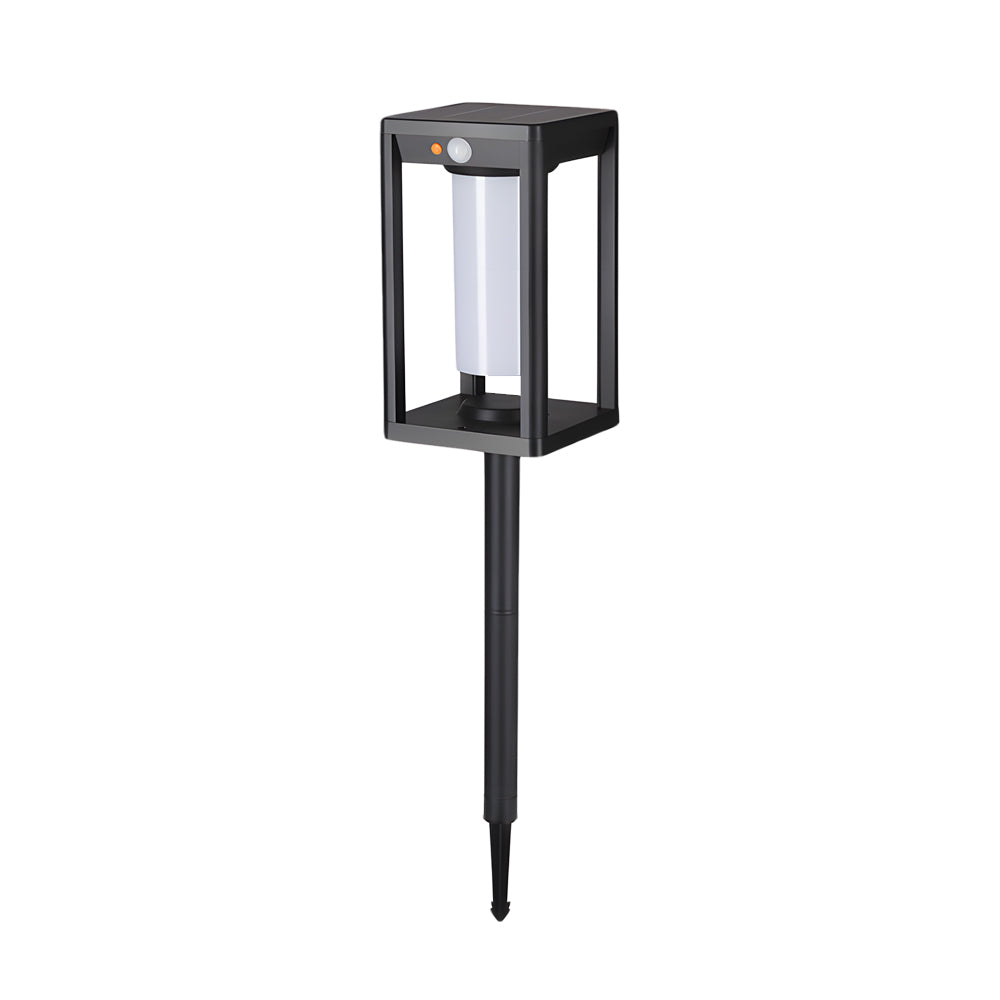 Black metal lantern-style garden stake light with clear glass panels and ground spike mounting