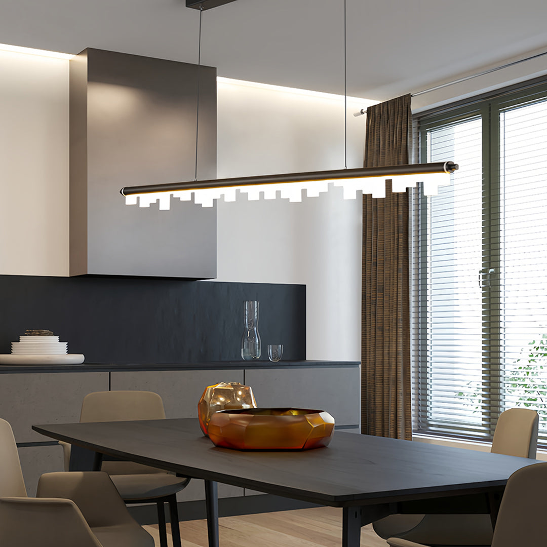 Black metal pendant light installation providing elegant overhead lighting in modern living area