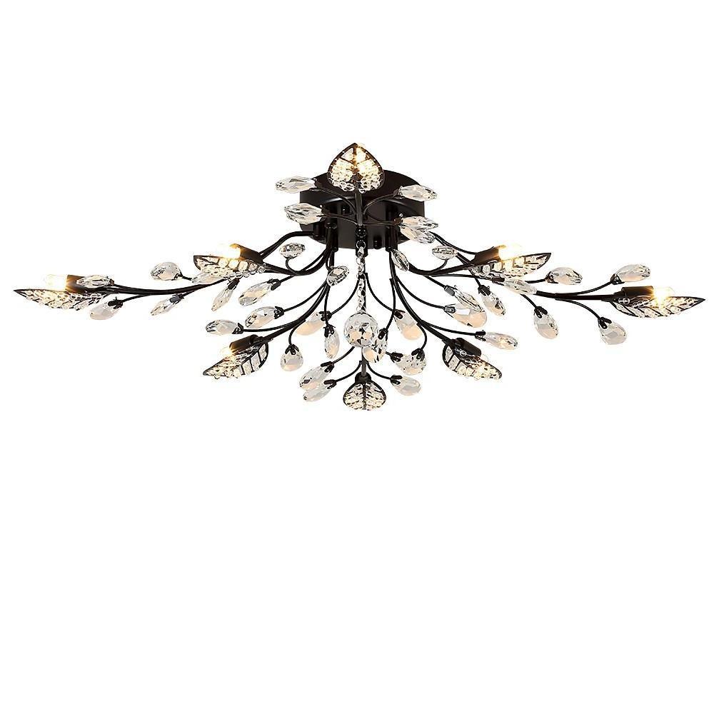 Black modern branch chandelier isolated on a white background with branch-style arms and crystal accents.