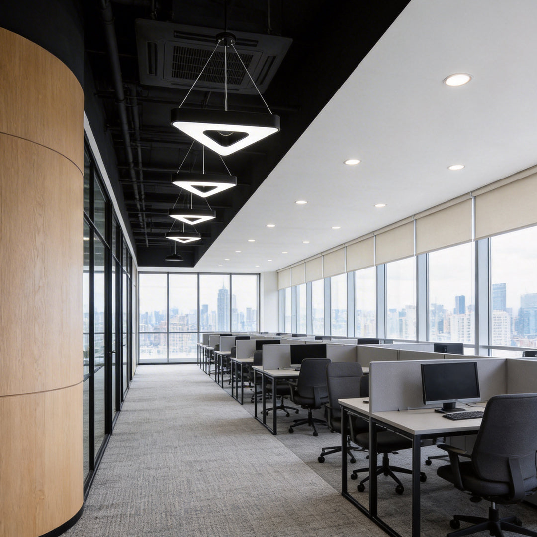 Black modern chandeliers with a close-up of their sleek triangular structure.