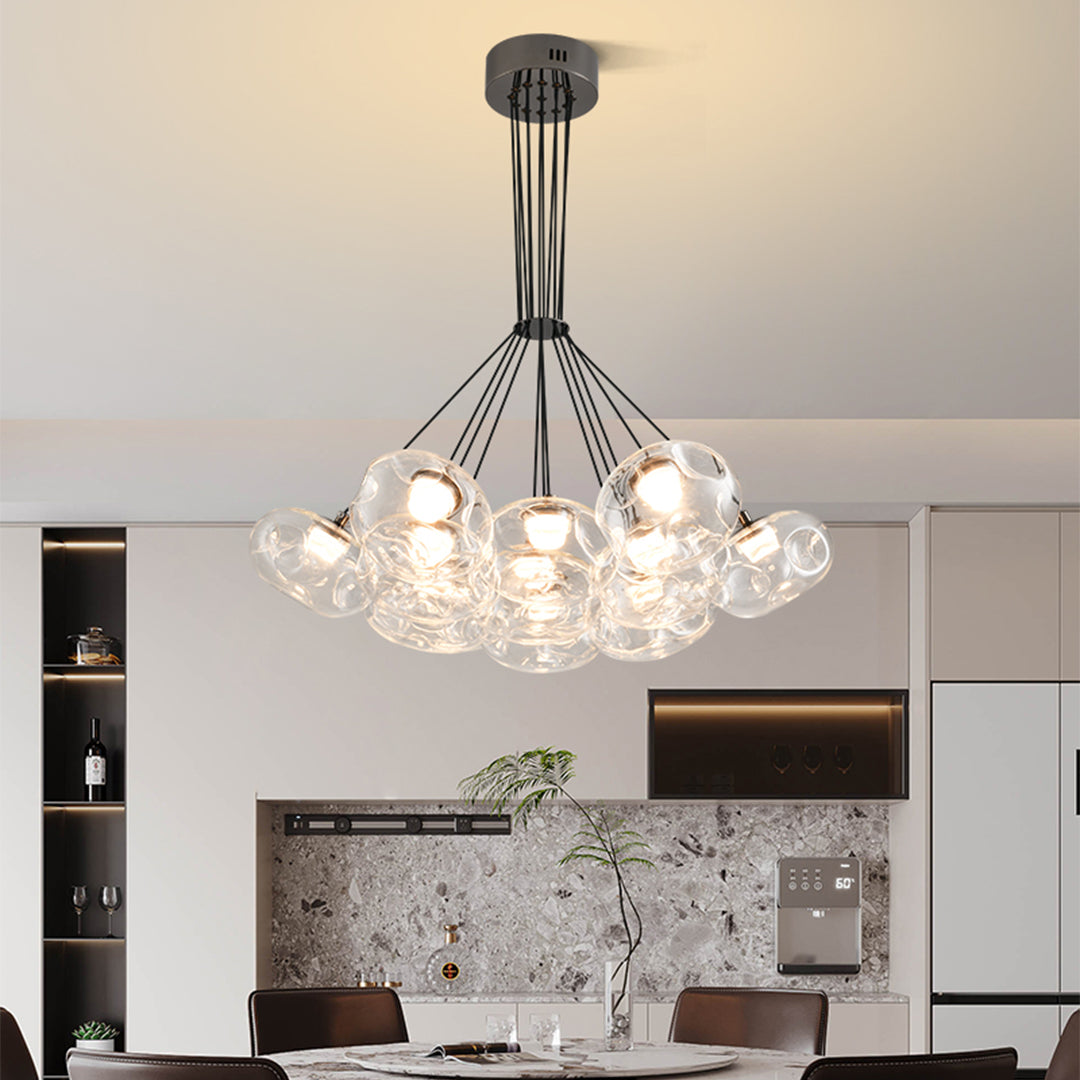 Multi light chandelier with black ceiling mount creating stunning focal point in minimalist living space