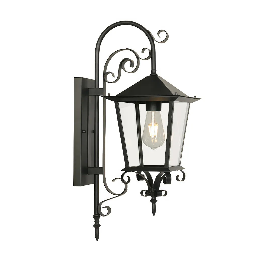 Black outdoor sconce isolated on a white background, showing the full lantern fixture with ornate bracket details.