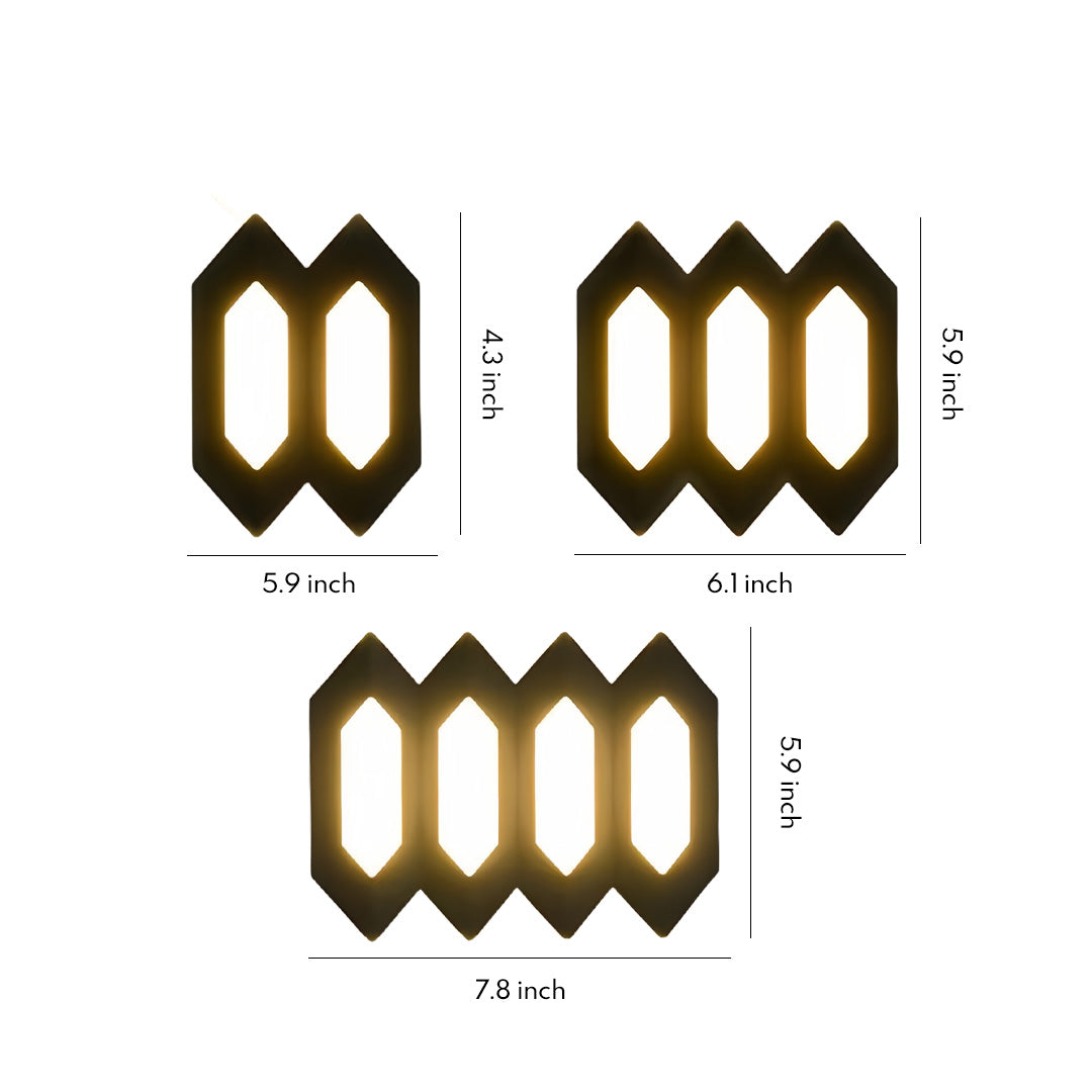 Black outdoor up and down wall lights shown in multiple sizes with a geometric honeycomb frame on a plain white background.