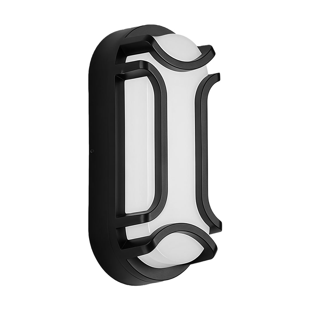 Sleek black outdoor wall sconce installed on a beige wall, providing stylish lighting for an outdoor patio.