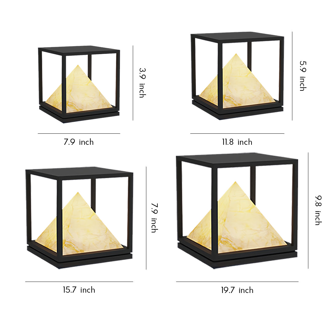 Modern multi-angle display of black-frame pyramid light pillar design showcasing warm ambient illumination.