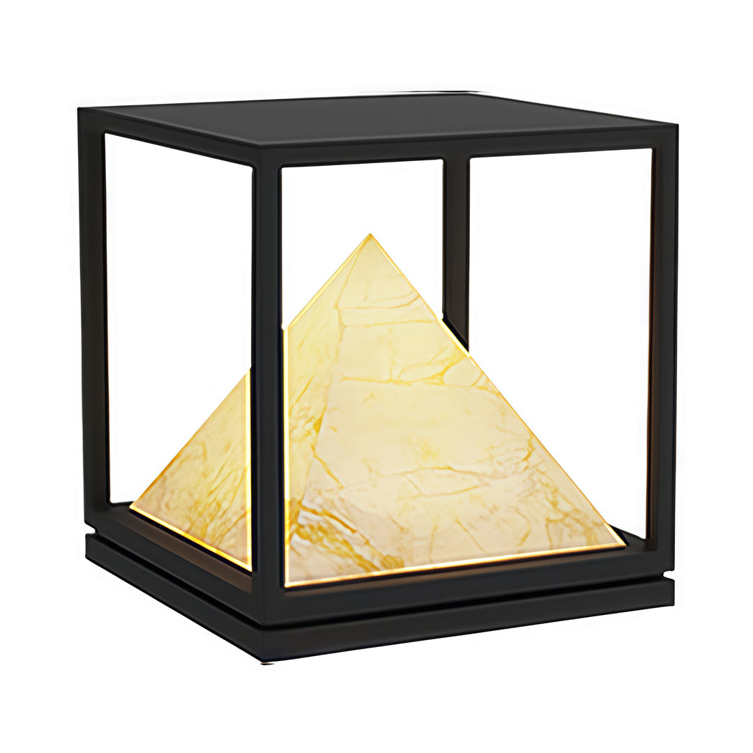 Tall black-frame outdoor lamp with pyramid-shaped lighting core in contemporary light pillar design.